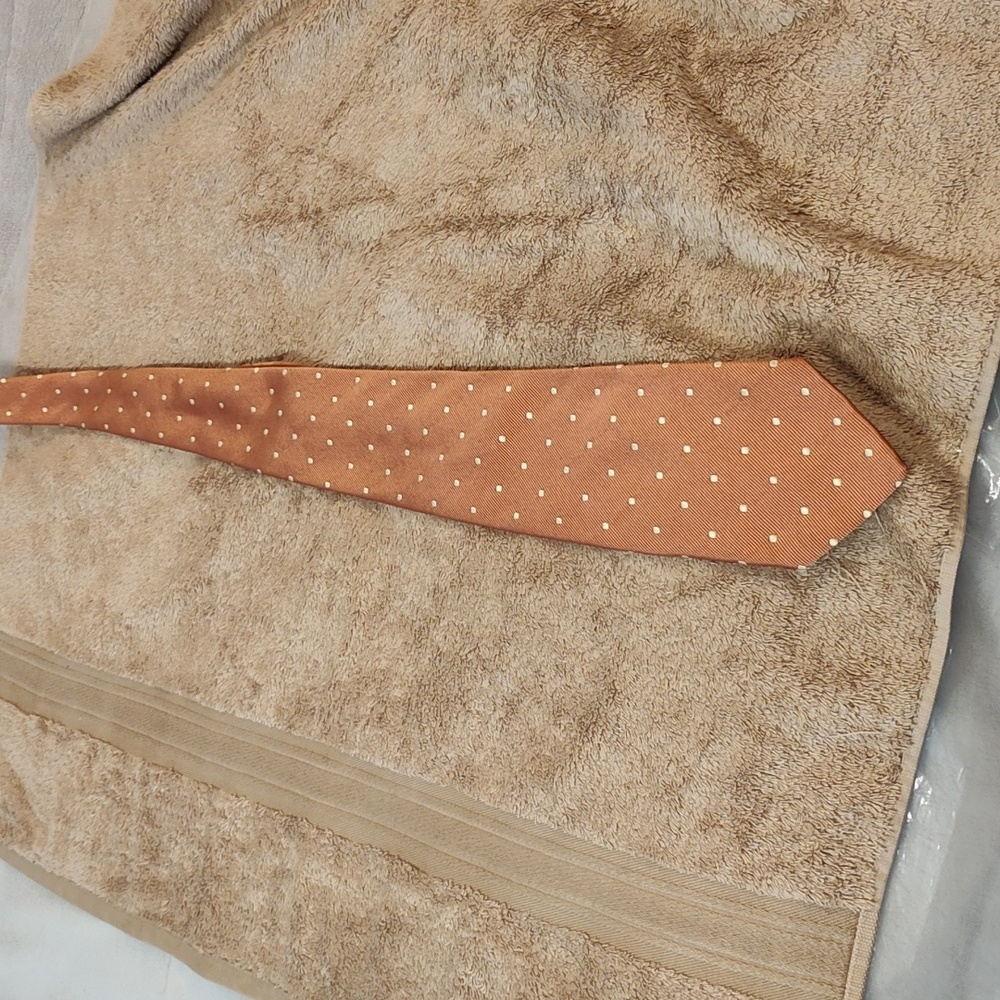 A designer, Joseph Abboud, dress tie in pristine condition.